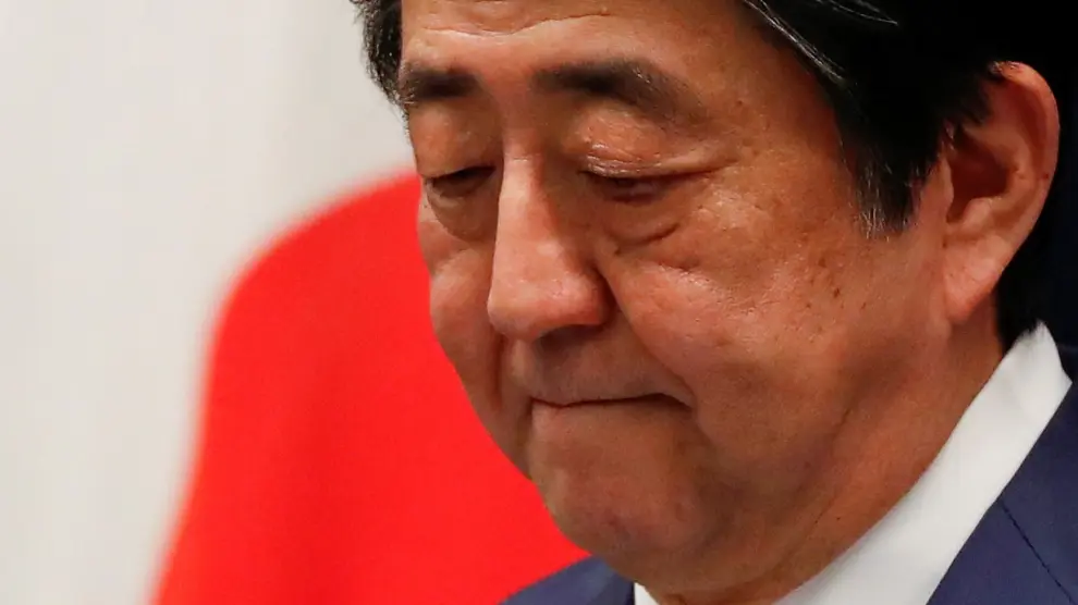 FILE PHOTO : Japan's Prime Minister Shinzo Abe attends a news conference on Japan's response to the coronavirus outbreak at his official residence in Tokyo