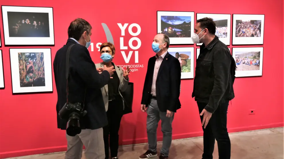 Javier Belver, Maribel de Pablo, Ramón Lasaosa y José Miguel Marco, en la inauguración de la exposición en Huesca.