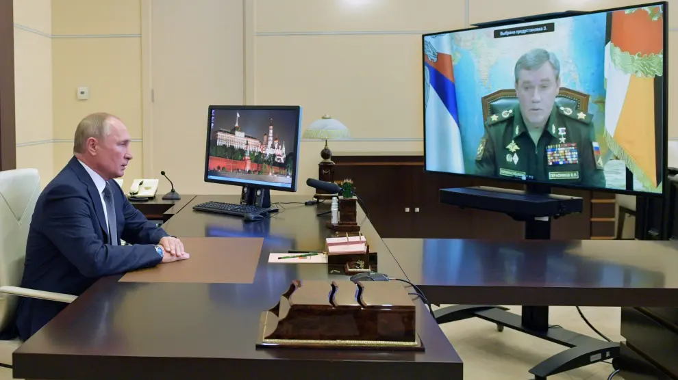 Russian President Putin meets with Chief of the Russian Armed Forces' General Staff Gerasimov via a video conference call, outside Moscow