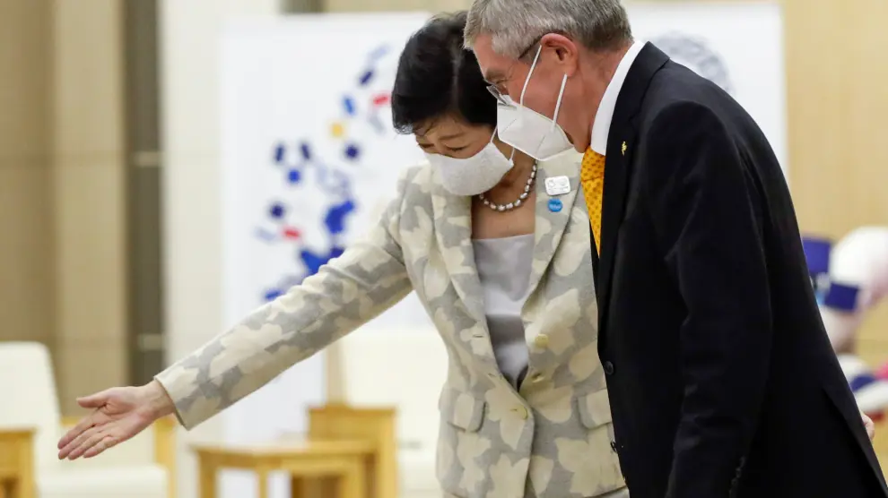 Thomas Bach, President of the International Olympic Committee (IOC), is accompanied by Tokyo Governor Yuriko Koike at the start of their talks at Tokyo Metropolitan Government Office Building in Tokyo