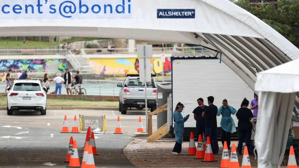 Medical workers are seen at a COVID-19 testing centre at Bondi Beach in Sydney