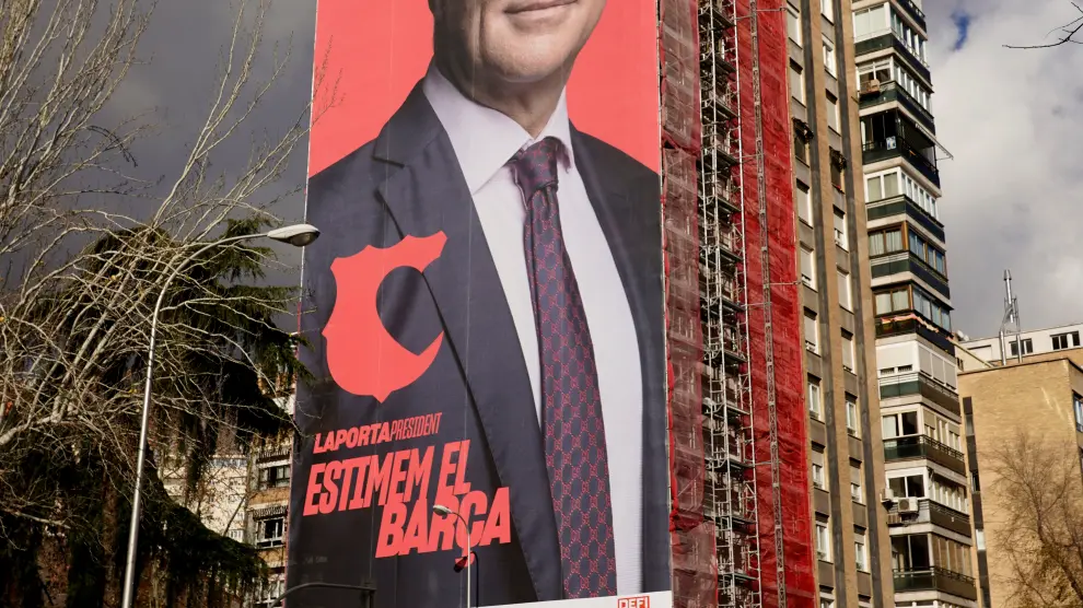 A giant electoral poster of FC Barcelona presidential hopeful Joan Laporta is seen on a building next to the Santiago Bernabeu Stadium in Madrid