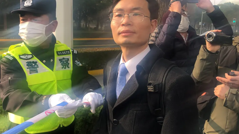Lawyer Zhang Keke arrives to a court in Shanghai