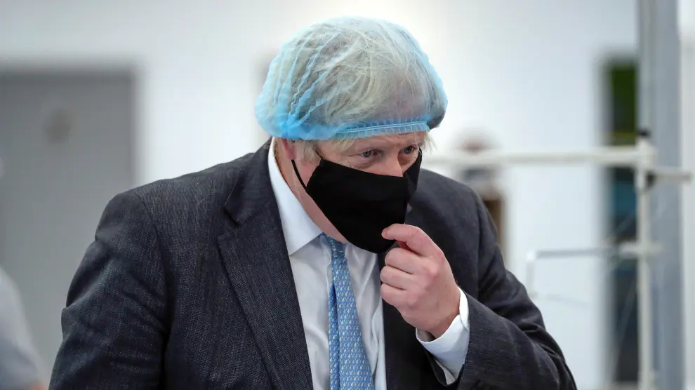 Britain's Prime Minister Boris Johnson visits a PPE manufacturing facility, in Seaton Delaval