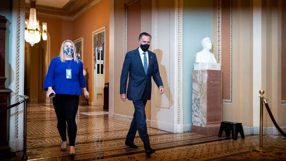 U.S. Senator Mitt Romney (R-UT) walks to the Senate floor in the U.S. Capitol on the fifth day of the impeachment trial of former U.S. President Donald Trump