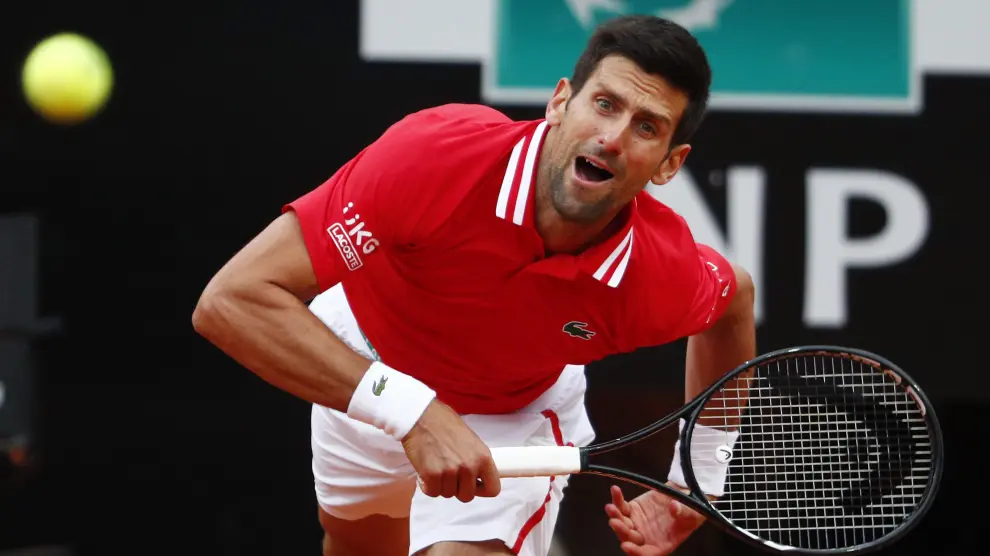 Tennis - ATP Masters 1000 - Italian Open - Foro Italico, Rome, Italy - May 16, 2021 Serbias Novak Djokovic in action during his final match against Spains Rafael Nadal REUTERS/Guglielmo Mangiapane[[[REUTERS VOCENTO]]] TENNIS-ROME/