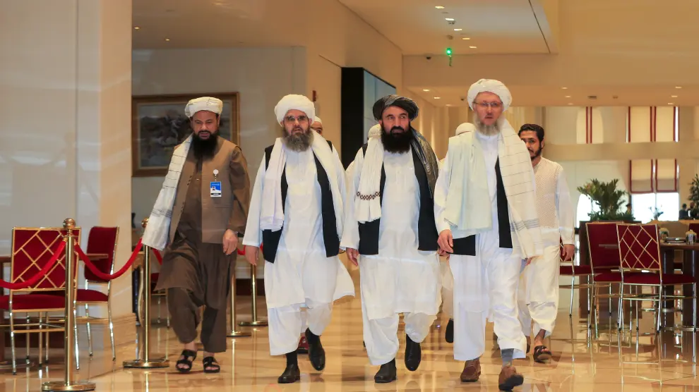 Abdul Salam Hanafi, member of the Taliban negotiating team and the Taliban delegation, arrive for Afghan peace talks in Doha