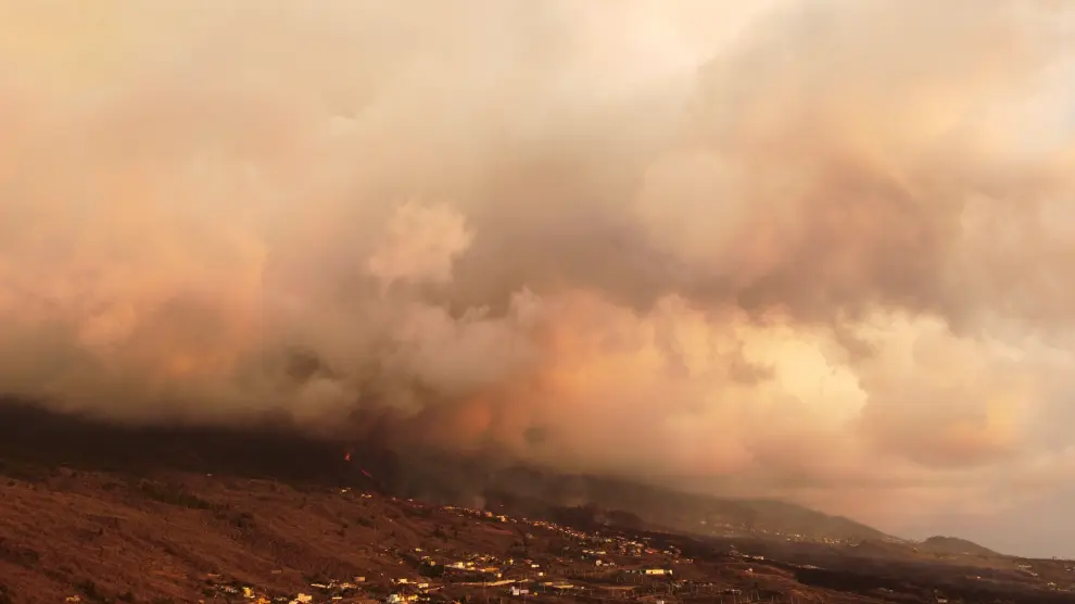 Smoke rises following the eruption of a volcano in Tajuya, on the Canary Island of La Palma