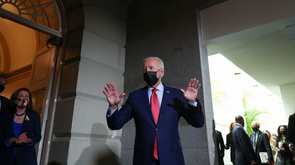 U.S. President Joe Biden talks to reporters after meeting with Democratic lawmakers to promote his bipartisan infrastructure bill at U.S. Capitol in Washington