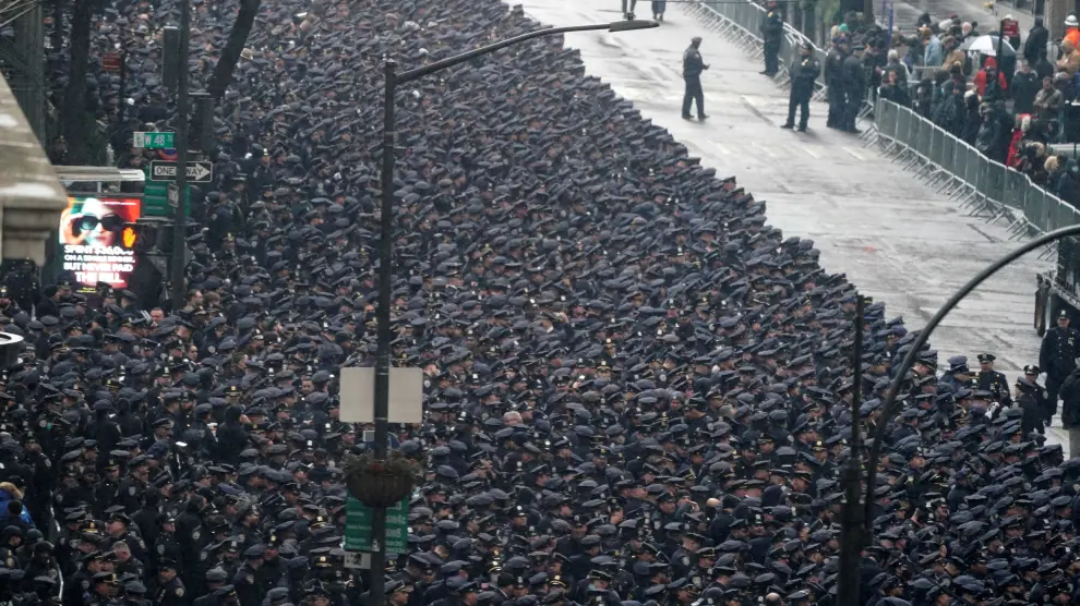 Police officers attend a funeral service for NYPD officer Jason Rivera, who was killed in the line of duty while responding to a domestic violence call, at St. Patrick's Cathedral in the Manhattan borough of New York City, U.S., January 28, 2022. REUTERS/David 'Dee' Delgado NEW YORK-SHOOTING/