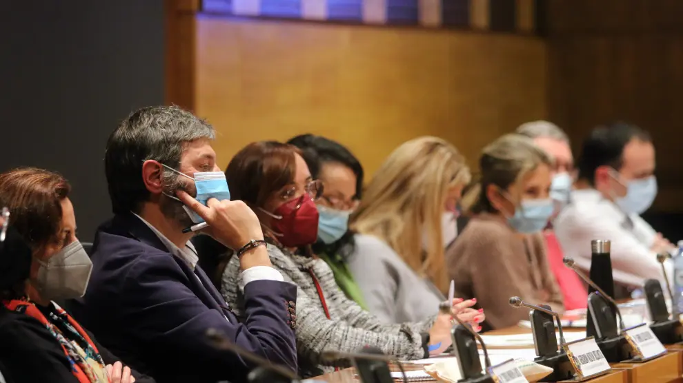 Concejales del grupo del PP durante un pleno en el Ayuntamiento de Huesca.