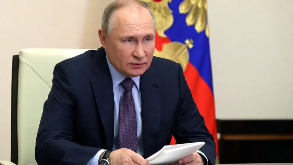 Russia's President Vladimir Putin chairs a meeting outside Moscow