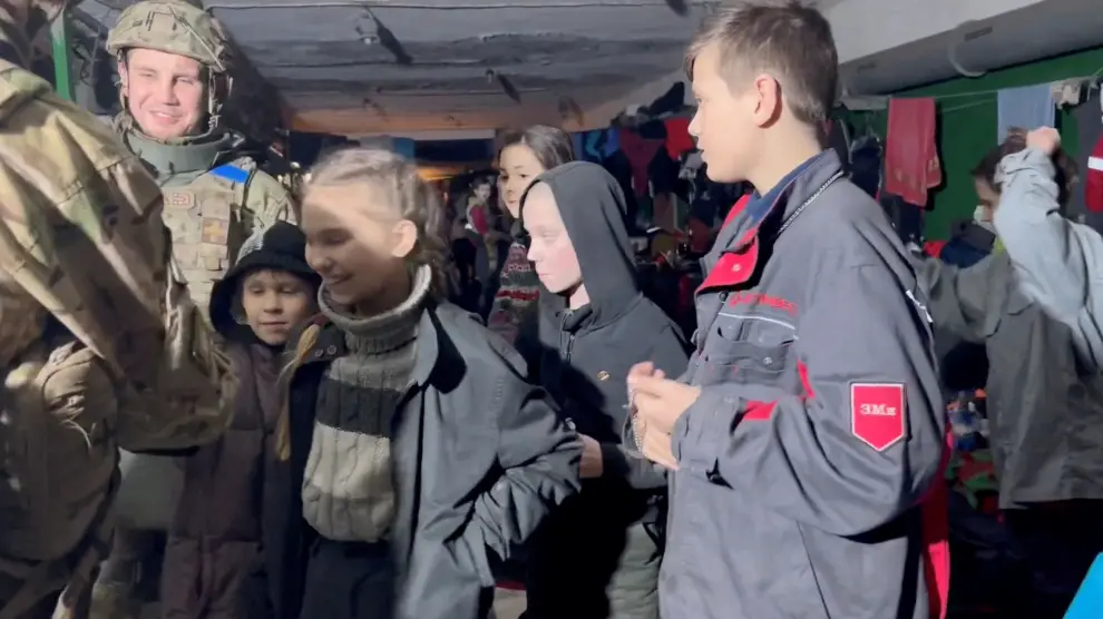 Civilians take shelter in bunker, in Mariupol