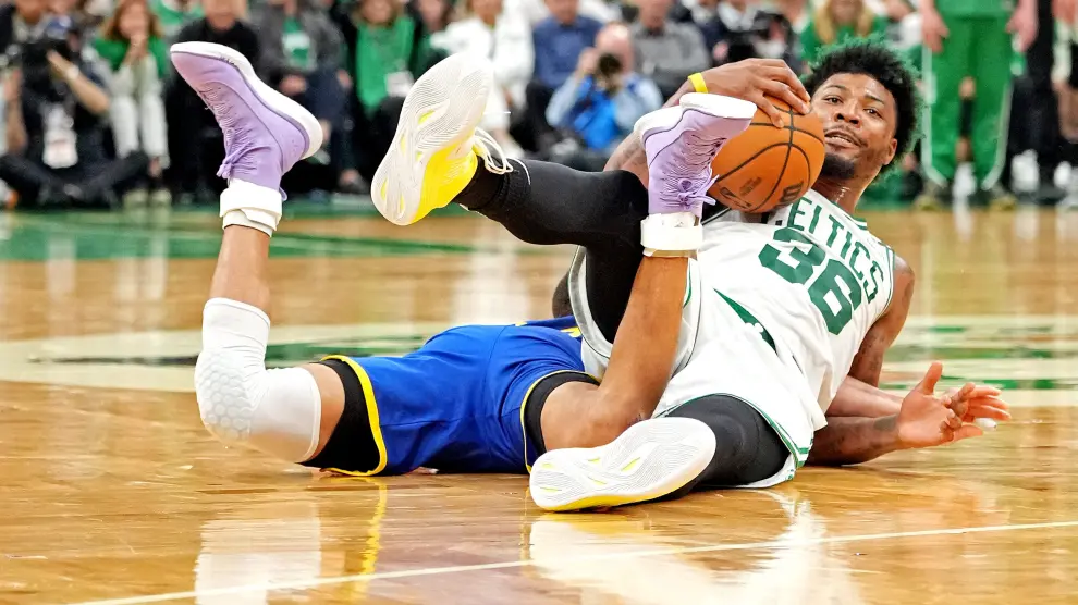 Jun 16, 2022; Boston, Massachusetts, USA; Golden State Warriors guard Gary Payton II (0) dunks and scores against the Boston Celtics during the fourth quarter of game six in the 2022 NBA Finals at the TD Garden. Mandatory Credit: Paul Rutherford-USA TODAY Sports BASKETBALL-NBA-BOS-GSW/