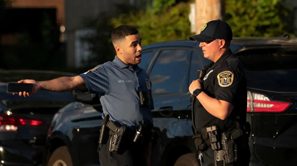 New Jersey police officers arrive near the building where alleged attacker of Salman Rushdie, Hadi Matar, lives in Fairview, New Jersey