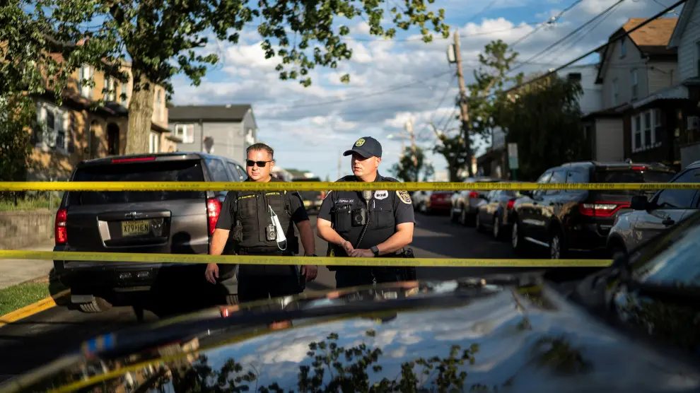 New Jersey Police officers stand guard near the building where alleged attacker of Salman Rushdie, Hadi Matar, lives in Fairview