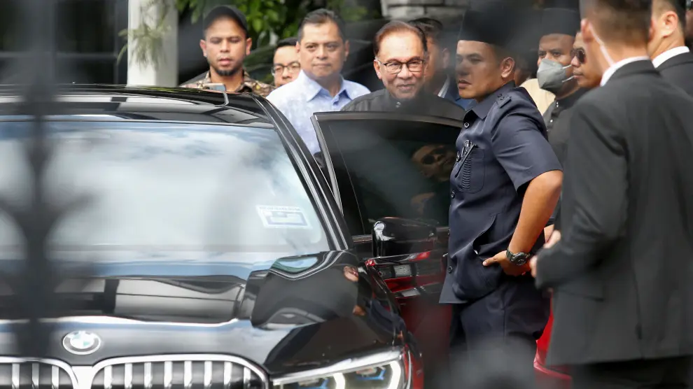 Malaysia's new Prime Minister Anwar Ibrahim leaves his house in Kajang