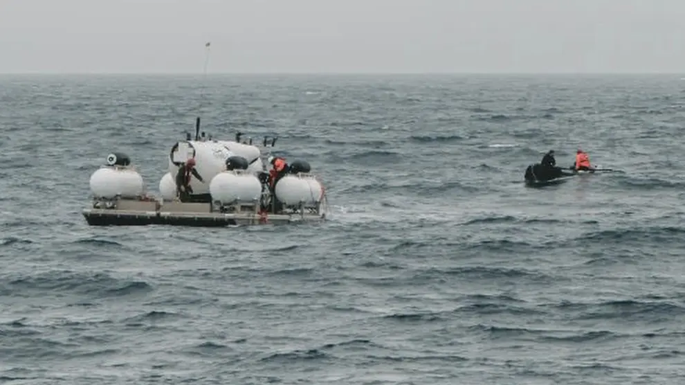 FILE - In this image released by Action Aviation, the submersible Titan is prepared for a dive into a remote area of the Atlantic Ocean on an expedition to the Titanic on Sunday, June 18, 2023. Rescuers are racing against time to find the missing submersible carrying five people, who were reported overdue Sunday night. (Action Aviation via AP, File)