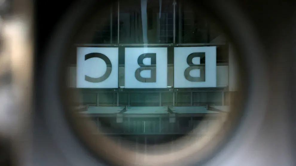 FILE PHOTO: A BBC logo is reflected in the viewfinder of a television camera outside the British Broadcasting Corporation (BBC) headquarters in London, Britain, March 13, 2023. REUTERS/Henry Nicholls/File Photo