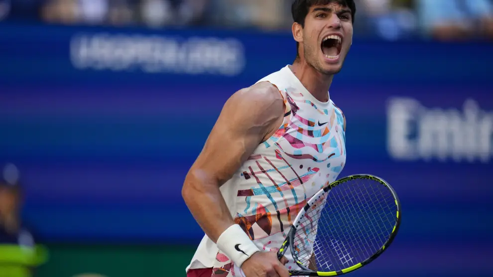 Carlos Alcaraz, of Spain, reacts during a match against Daniel Evans, of the United Kingdom, during the third round of the U.S. Open tennis championships, Saturday, Sept. 2, 2023, in New York. (AP Photo/Manu Fernandez)