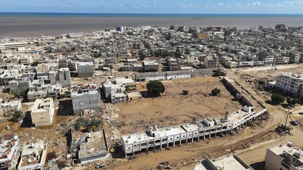 A general view of the flooded city of Derna, Libya, is seen Wednesday, Sept. 13, 2023. The rainwater that gushed down Derna's mountainside and into the city has killed thousands and left thousands more missing, washing entire neighborhoods out to sea. AP Photo/Muhammad J. Elalwany)