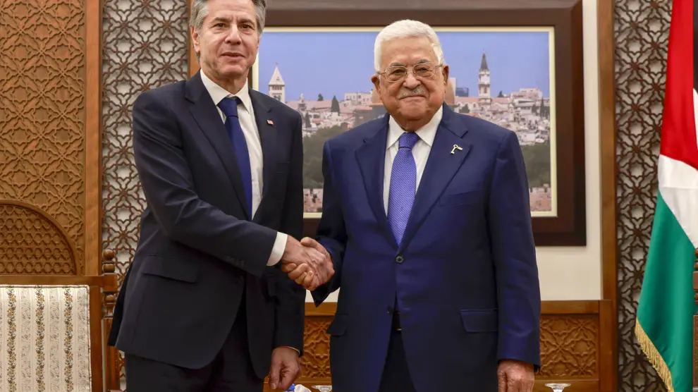 US Secretary of State, Antony Blinken, left, meets with Palestinian president Mahmud Abbas, right, in Ramallah in the Israeli-occupied West Bank on Wednesday, Jan. 10, 2024, during his week-long trip aimed at calming tensions across the Middle East. (Jaafar Ashtiyeh/Pool Photo via AP)