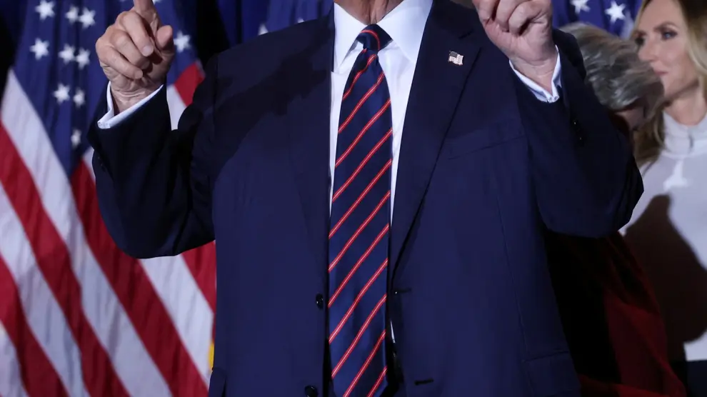 Republican presidential candidate and former U.S. President Donald Trump gestures during his New Hampshire presidential primary election night watch party, in Nashua, New Hampshire, U.S., January 23, 2024. REUTERS/Mike Segar [[[REUTERS VOCENTO]]]