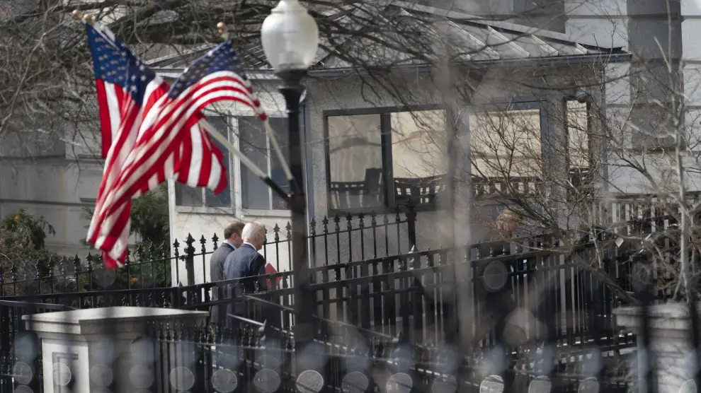 President Joe Biden walks to the Eisenhower Executive Office Building on the White House complex in Washington to participate in a video conference call with G7 leaders and Ukraine's President Volodymyr Zelenskyy to discuss support for Ukraine, Saturday, Feb. 24, 2024. (AP Photo/Stephanie Scarbrough)