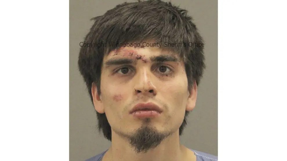 This photo provided by Winnebago County, Ill., Sheriff's Office shows Christian Ivan Soto. Soto, 22, of Rockford, Ill., who was charged Thursday, March 28, 2024, with first-degree murder in a stabbing rampage that killed four people in northern Illinois, Winnebago County State’s Attorney J. Hanley said. (Winnebago County Sheriff's Office via AP)