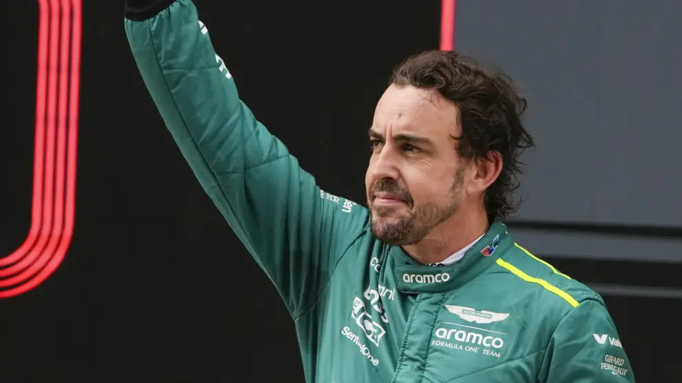 Aston Martin driver Fernando Alonso of Spain gestures following his third place finish in qualifying at the Chinese Formula One Grand Prix at the Shanghai International Circuit, Shanghai, China, Saturday, April 20, 2024. (AP Photo/Andy Wong)