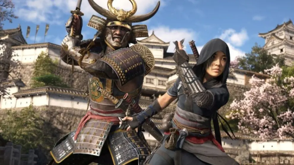 Naoe, una hábil Assassin, y Yasuke, un legendario samurái, se preparan para la batalla en el Japón feudal del siglo XVI en Assassin's Creed Shadows, el nuevo juego de Ubisoft Quebec. La imagen refleja la combinación de combate y sigilo que caracterizará a los personajes principales del juego, cuyo lanzamiento está programado para el 15 de noviembre de 2024.