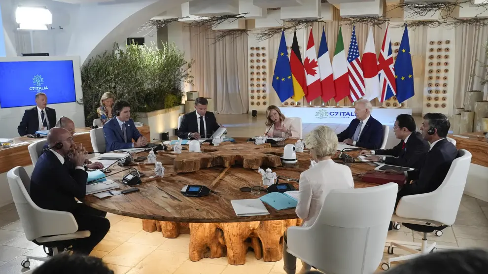 From left, European Council President Charles Michel, German Chancellor Olaf Scholz, Canada's Prime Minister Justin Trudeau, French President Emmanuel Macron, Italian Prime Minister Giorgia Meloni, U.S. President Joe Biden, Japan's Prime Minister Fumio Kishida, Britain's Prime Minister Rishi Sunak and European Commission President Ursula von der Leyen participate in a working session at the G7, Thursday, June 13, 2024, in Borgo Egnazia, Italy. (AP Photo/Alex Brandon, Pool) Associated Press / LaPresse Only italy and Spain