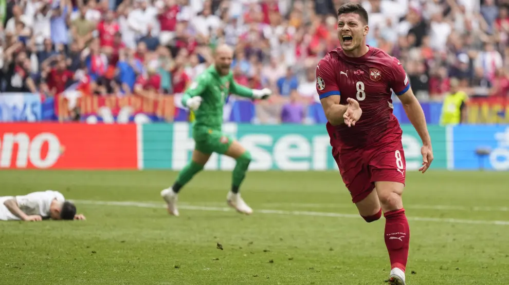 Serbia's Luka Jovic celebrates after scoring his side first goal during a Group C match between Slovenia and Serbia at the Euro 2024 soccer tournament in Munich, Germany, Thursday, June 20, 2024. (AP Photo/Matthias Schrader)
