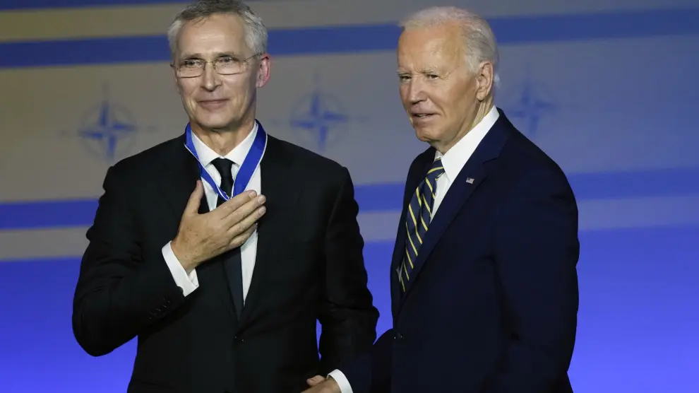 President Joe Biden, right, presents NATO Secretary General Jens Stoltenberg with the Presidential Medal of Freedom on the 75th anniversary of NATO at the Andrew W. Mellon Auditorium, Tuesday, July 9, 2024, in Washington(AP Photo/Susan Walsh)