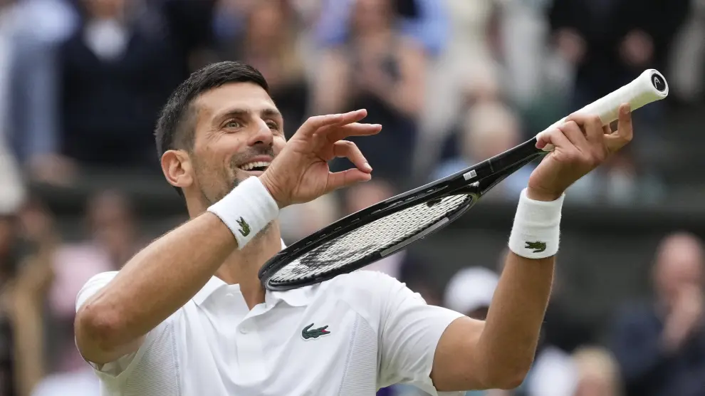 Novak Djokovic of Serbia reacts after defeating Lorenzo Musetti of Italy in their semifinal match at the Wimbledon tennis championships in London, Friday, July 12, 2024.(AP Photo/Kirsty Wigglesworth)