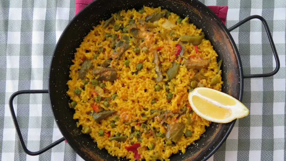 La paella es uno de los platos más típicos de Valencia, pero no el que más se pide a domicilio