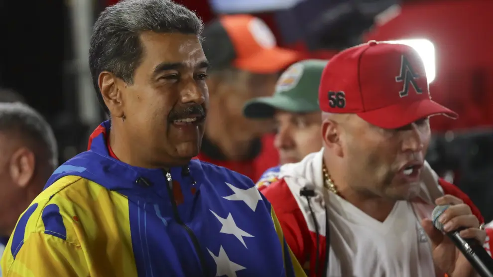 El presidente de Venezuela, Nicolás Maduro, celebra tras conocer los resultados de las elecciones presidenciales este domingo, en Caracas (Venezuela).