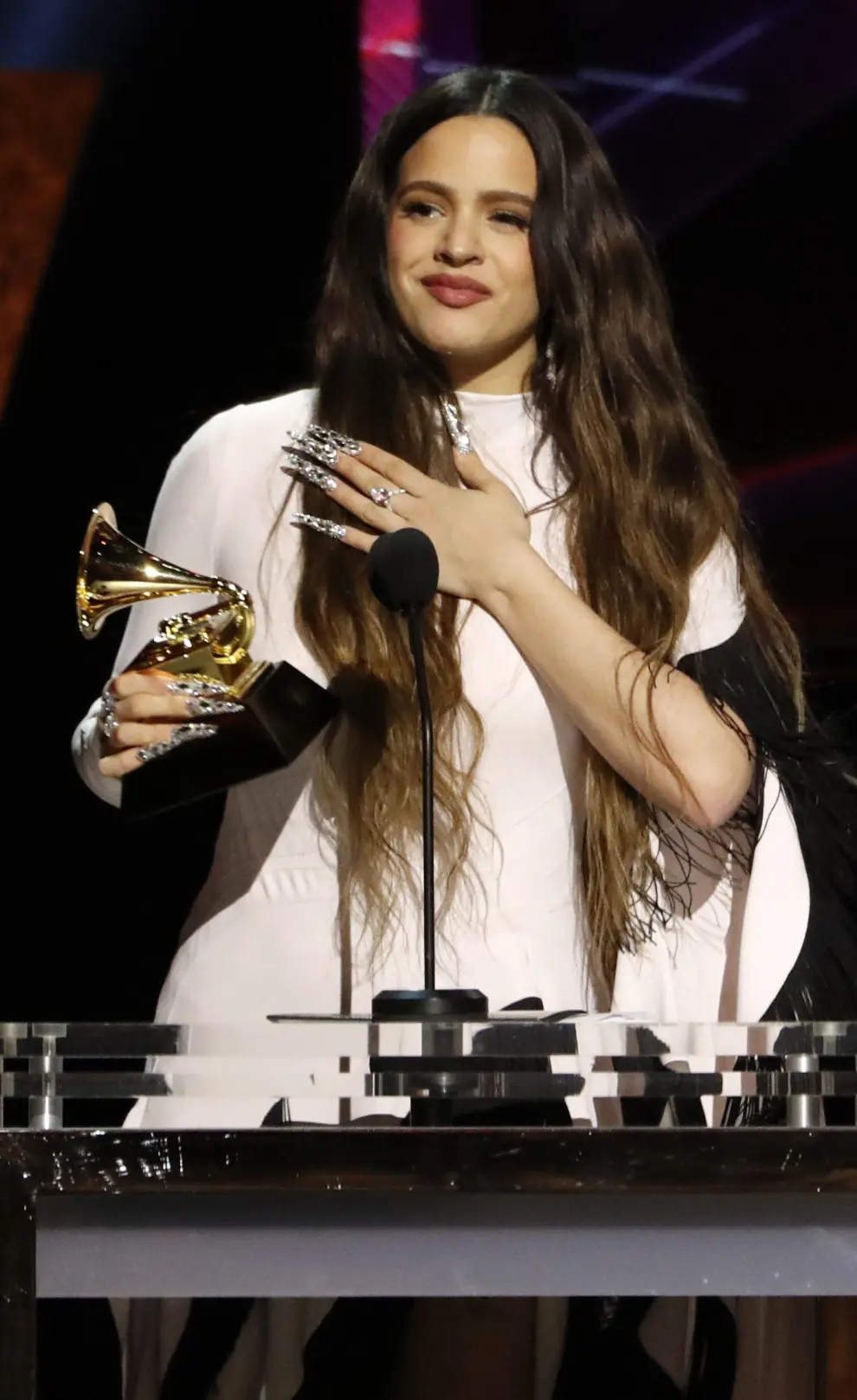62nd Grammy Awards - Show - Los Angeles, California, U.S., January 26, 2020 - Rosalia accepts the award for Best Latin Rock, Urban or Alternative Album for "El Mal Querer." REUTERS/Mario Anzuoni [[[REUTERS VOCENTO]]] AWARDS-GRAMMYS/