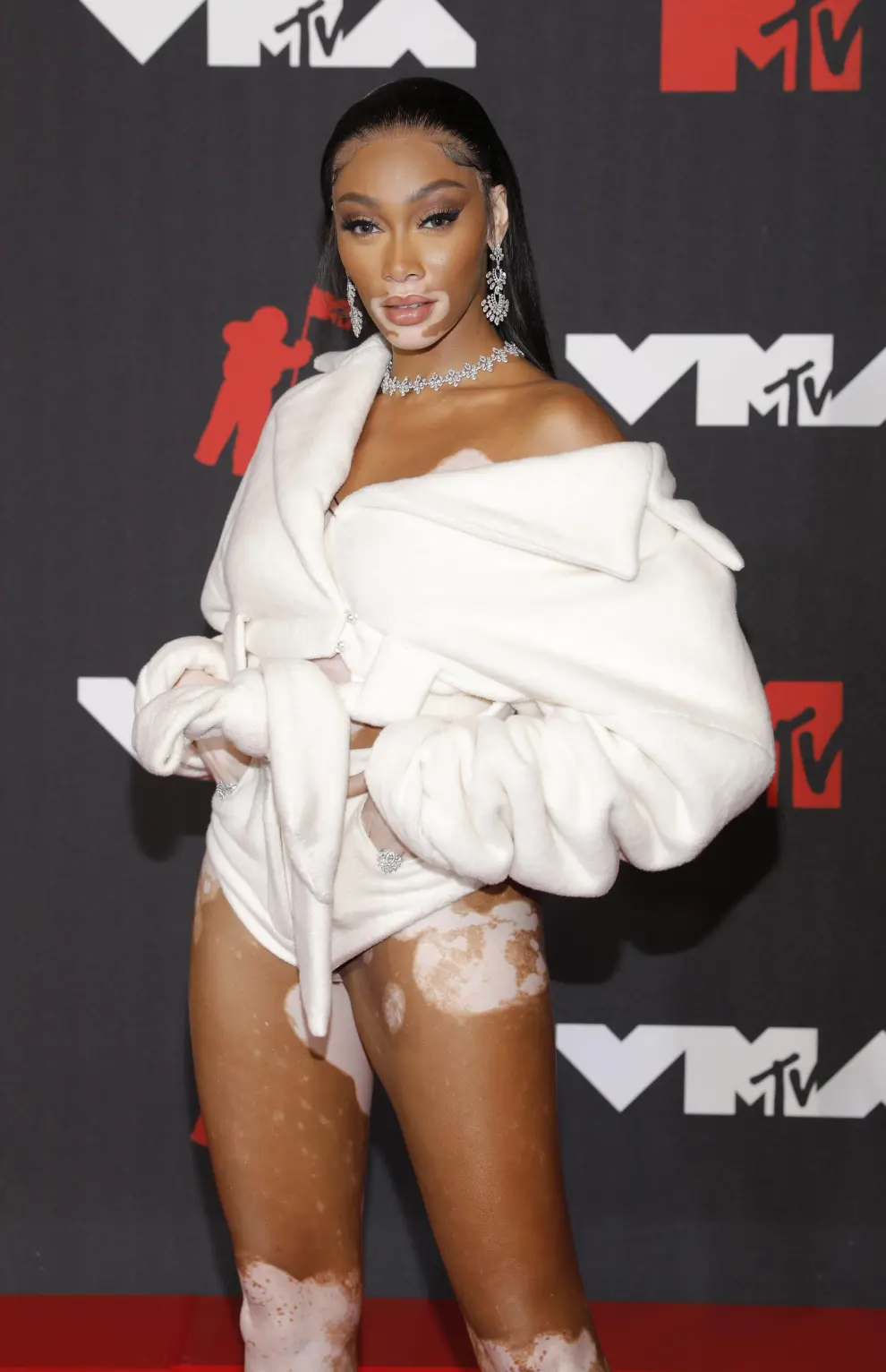 2021 MTV Video Music Awards - Arrivals - Barclays Center, Brooklyn, New York, U.S., September 12, 2021 - Travis Barker and Kourtney Kardashian. REUTERS/Andrew Kelly[[[REUTERS VOCENTO]]] AWARDS-VMA/