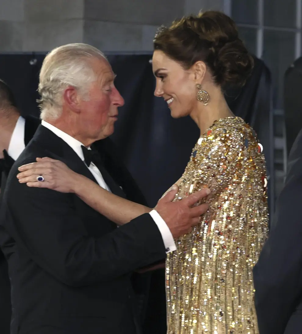 Britain's Prince Charles, left, speaks with Kate, the Duchess of Cambridge as they arrive for the World premiere of the new film from the James Bond franchise 'No Time To Die', in London on Sept. 28, 2021. (Chris Jackson/Pool Photo via AP, File)