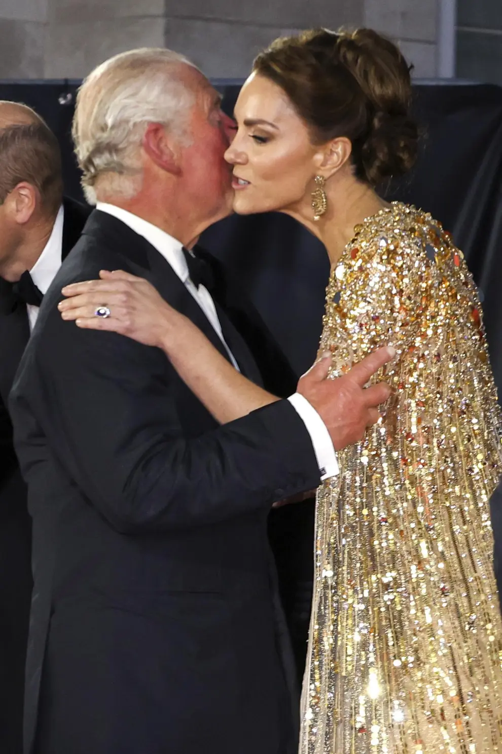 FILE - Britain's Prince Charles, left, reacts with Kate, the Duchess of Cambridge as they arrive for the World premiere of the new film from the James Bond franchise 'No Time To Die', in London Tuesday, Sept. 28, 2021. (Chris Jackson/Pool Photo via AP, File)