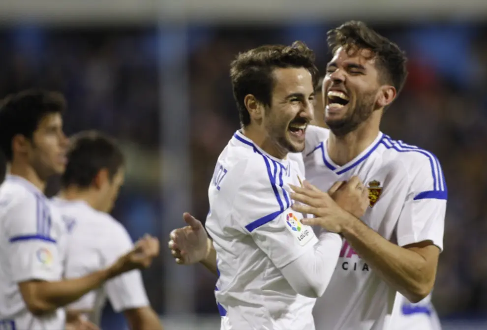 Cabrera y Juan Muñoz celebran el gol del uruguayo