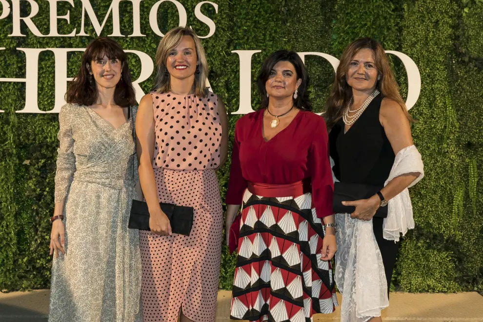 Irene Vallejo, Pilar Alegría, Paloma de Yarza y Reyes Palá, en la planta de Villanueva de Gállego en un instante previo a la gala.