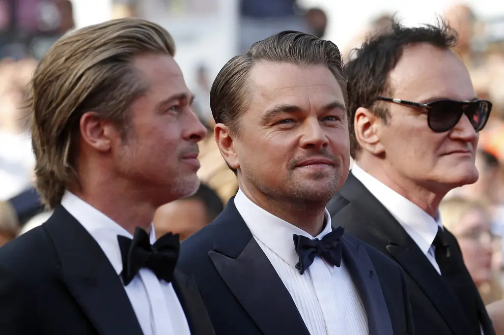72nd Cannes Film Festival - Screening of the film "Once Upon a Time in Hollywood" in competition - Red Carpet Arrivals - Cannes, France, May 21, 2019. Director Quentin Tarantino poses with cast members Leonardo DiCaprio and Brad Pitt. REUTERS/Stephane Mahe [[[REUTERS VOCENTO]]] FILMFESTIVAL-CANNES/ONCE UPON A TIME IN HOLLYWOOD