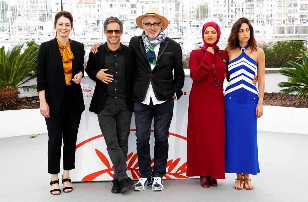 72nd Cannes Film Festival - Photocall for the film "It Must Be Heaven" in competition - Cannes, France, May 24, 2019.  Director Elia Suleiman poses with producers Fatma Al-Remaihi and Hanaa Issa. REUTERS/Regis Duvignau [[[REUTERS VOCENTO]]] FILMFESTIVAL-CANNES/IT MUST BE HEAVEN