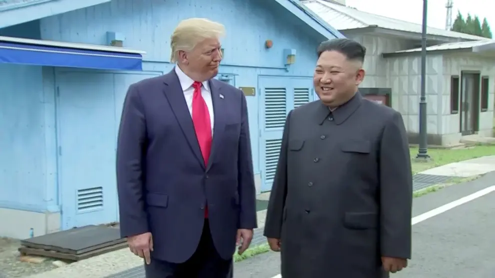 U.S. President Donald Trump and South Korean President Moon Jae-in are seen at the demilitarized zone (DMZ) separating the two Koreas, in Paju, South Korea, in this still image from video taken June 30, 2019. South Korean Pool/via REUTERS TV      SOUTH KOREA OUT. NO COMMERCIAL OR EDITORIAL SALES IN SOUTH KOREA [[[REUTERS VOCENTO]]] NORTHKOREA-USA/SOUTHKOREA