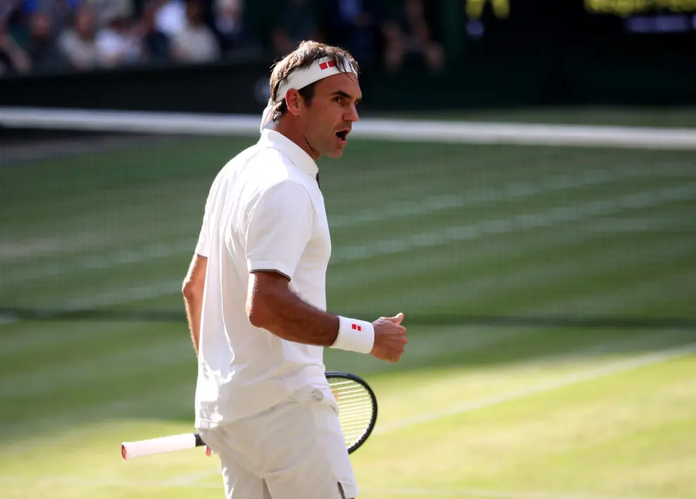 Tennis - Wimbledon - All England Lawn Tennis and Croquet Club, London, Britain - July 12, 2019  Switzerland's Roger Federer in action during his semi-final match against Spain's Rafael Nadal  Adrian Dennis/Pool via REUTERS [[[REUTERS VOCENTO]]] TENNIS-WIMBLEDON/