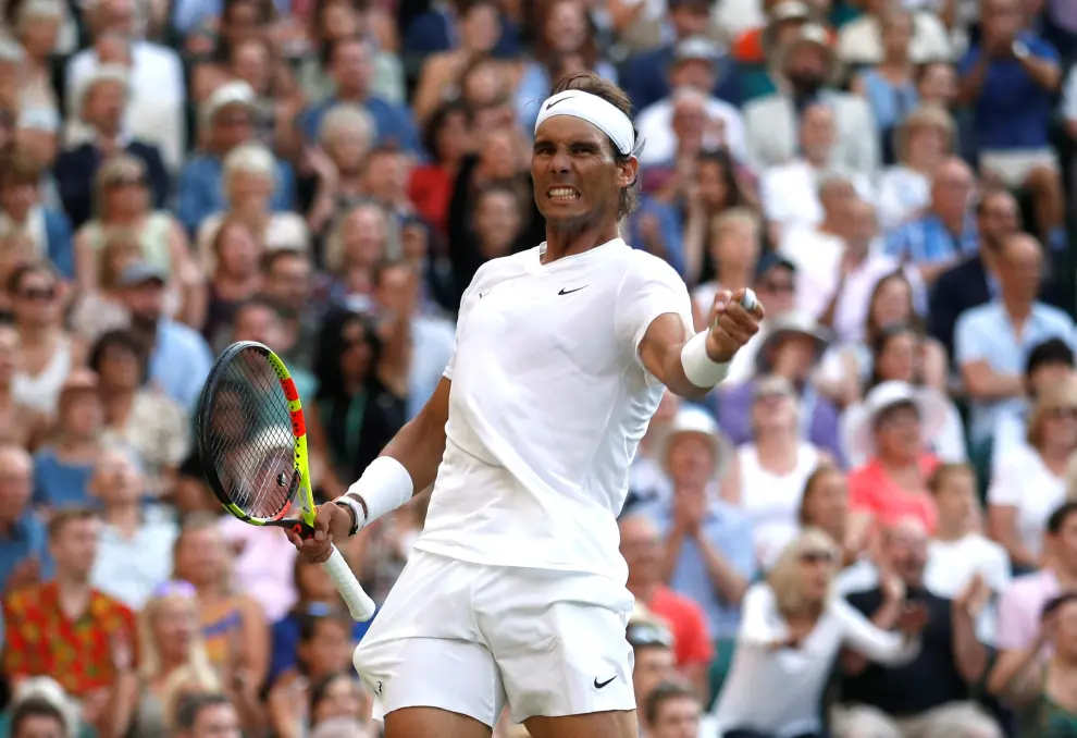 Tennis - Wimbledon - All England Lawn Tennis and Croquet Club, London, Britain - July 12, 2019  Spain's Rafael Nadal reacts during his semi-final match against Switzerland's Roger Federer   REUTERS/Carl Recine [[[REUTERS VOCENTO]]] TENNIS-WIMBLEDON/