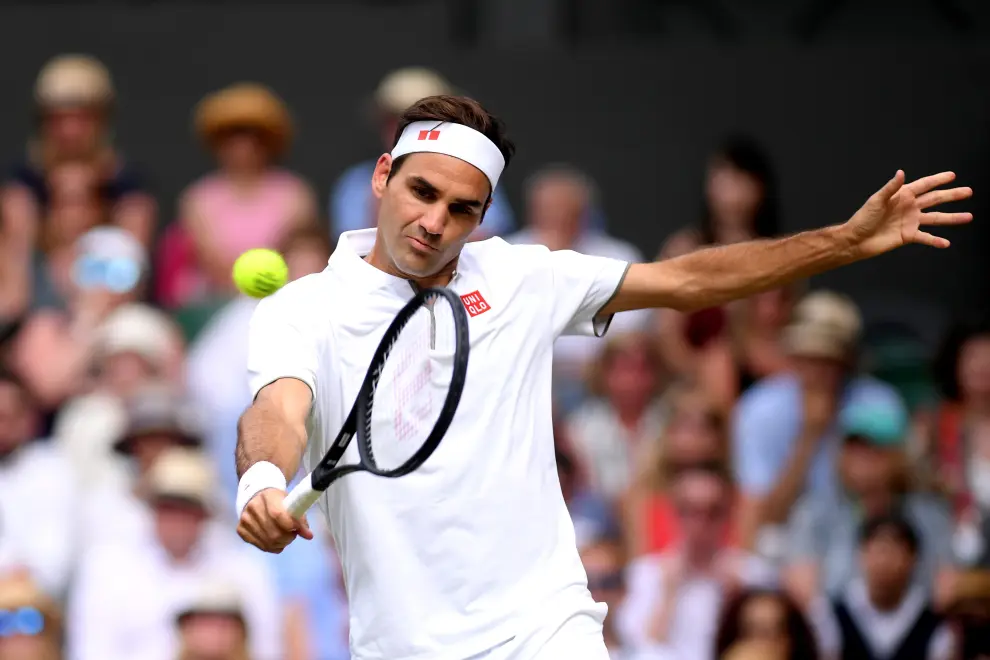Tennis - Wimbledon - All England Lawn Tennis and Croquet Club, London, Britain - July 14, 2019  Switzerland's Roger Federer in action during the final against Serbia's Novak Djokovic  REUTERS/Toby Melville [[[REUTERS VOCENTO]]] TENNIS-WIMBLEDON/