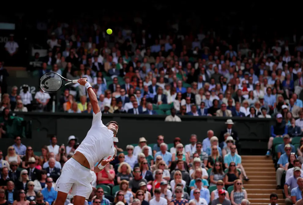 Tennis - Wimbledon - All England Lawn Tennis and Croquet Club, London, Britain - July 14, 2019  Serbia's Novak Djokovic in action during the final against Switzerland's Roger Federer  REUTERS/Andrew Couldridge     TPX IMAGES OF THE DAY [[[REUTERS VOCENTO]]] TENNIS-WIMBLEDON/